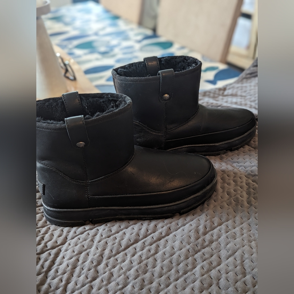 Uggs genuine leather waterproof black boot.